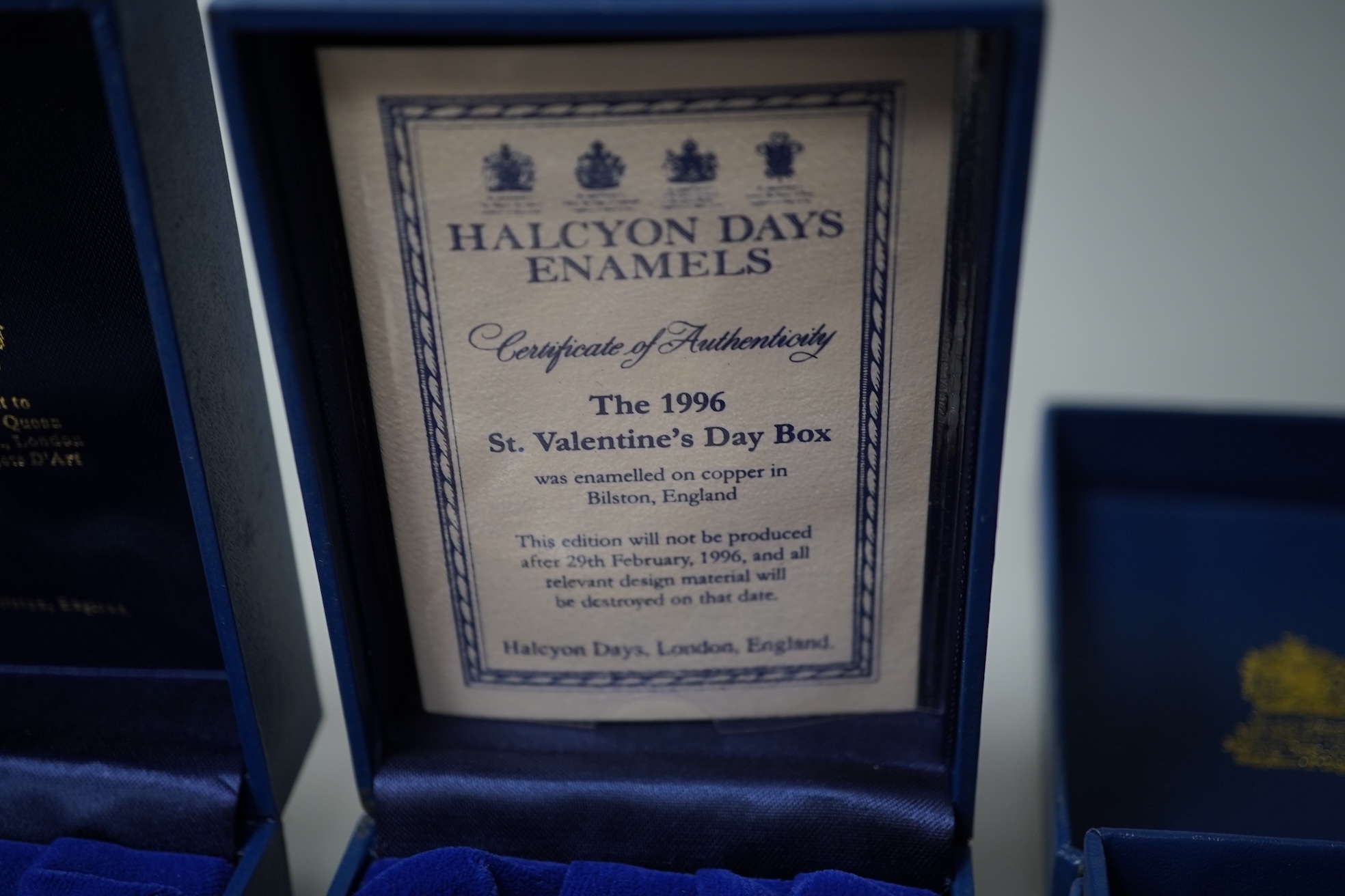 A collection of fourteen boxed Halcyon Days enamel trinket boxes, boxed